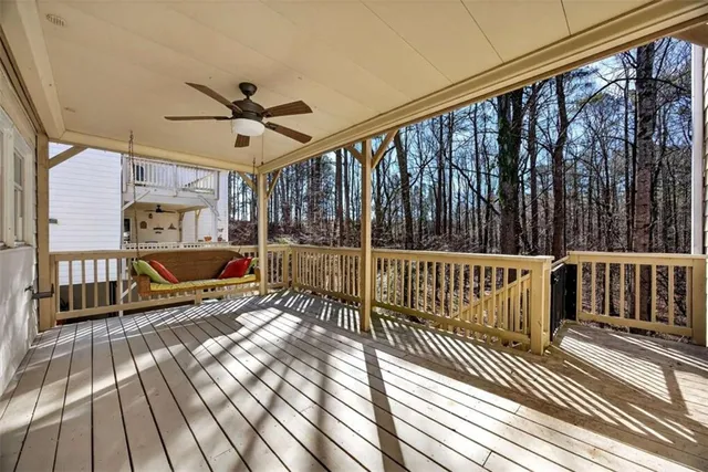 a view of a balcony with wooden floor