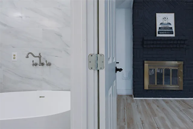 a bathroom with a white tub