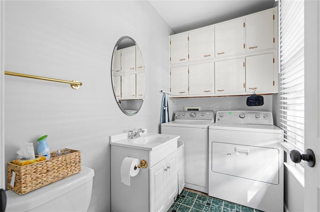 3698 Embry Circle Chamblee, GA 30341 - Photo 14 of 20 a view of storage and utility room with washer and dryer