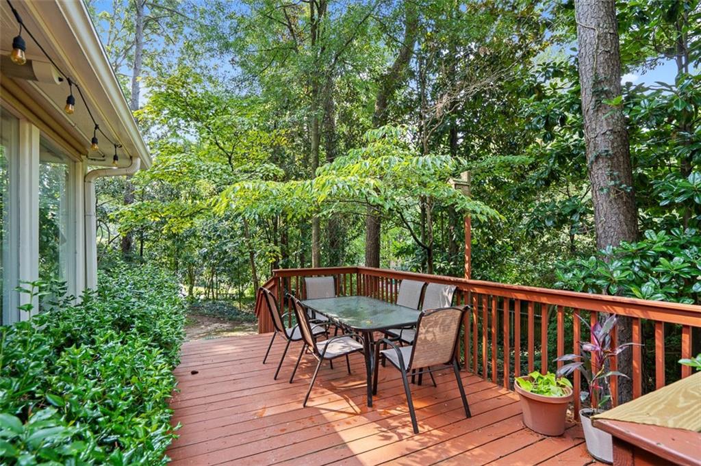 3698 Embry Circle Chamblee, GA 30341 - Photo 17 of 20 a view of a wooden chairs on the roof deck