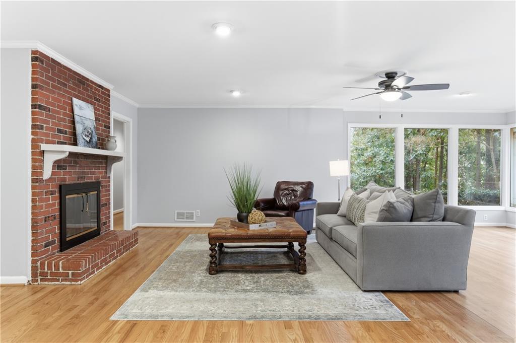 3698 Embry Circle Chamblee, GA 30341 - Photo 5 of 20 a living room with furniture and a fireplace