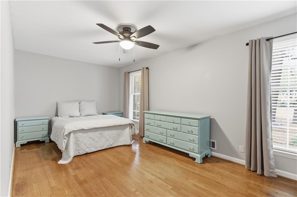 3698 Embry Circle Chamblee, GA 30341 - Photo 6 of 20 a bedroom with a bed and a window