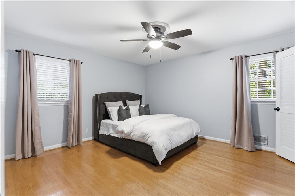 3698 Embry Circle Chamblee, GA 30341 - Photo 7 of 20 a bedroom with a bed and window