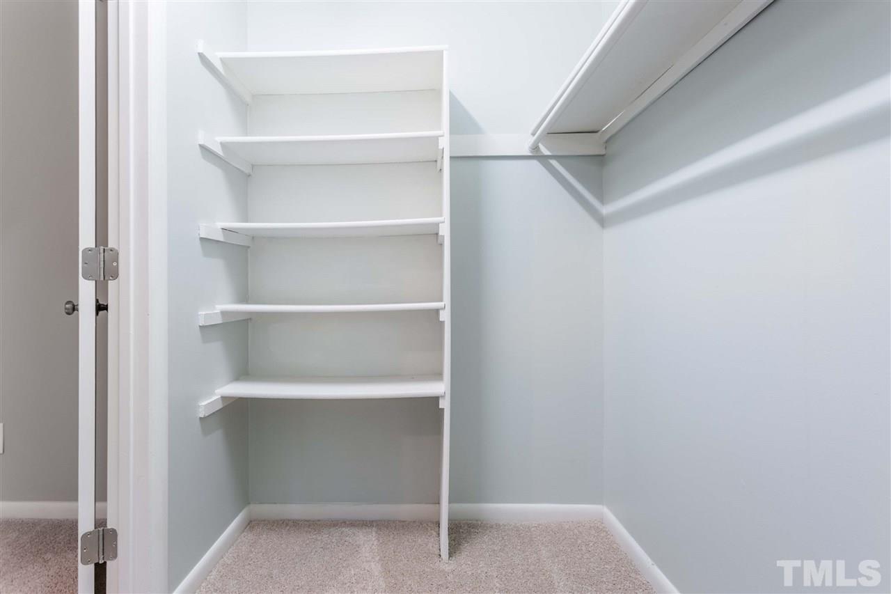 1016 Reca Road Garner, NC 27529 - Photo 14 of 25 a view of an empty walk in closet