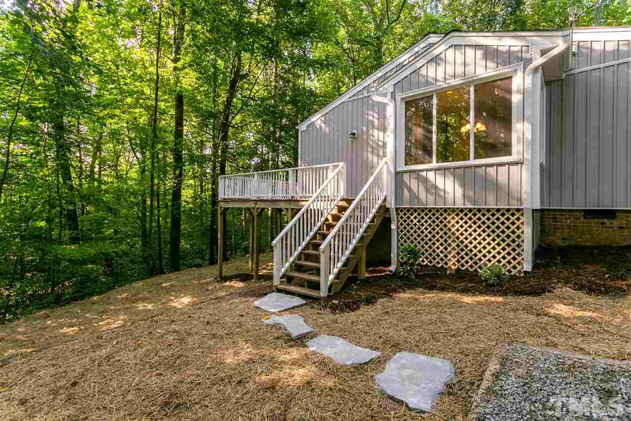 1016 Reca Road Garner, NC 27529 - Photo 22 of 25 a view of a house with a yard