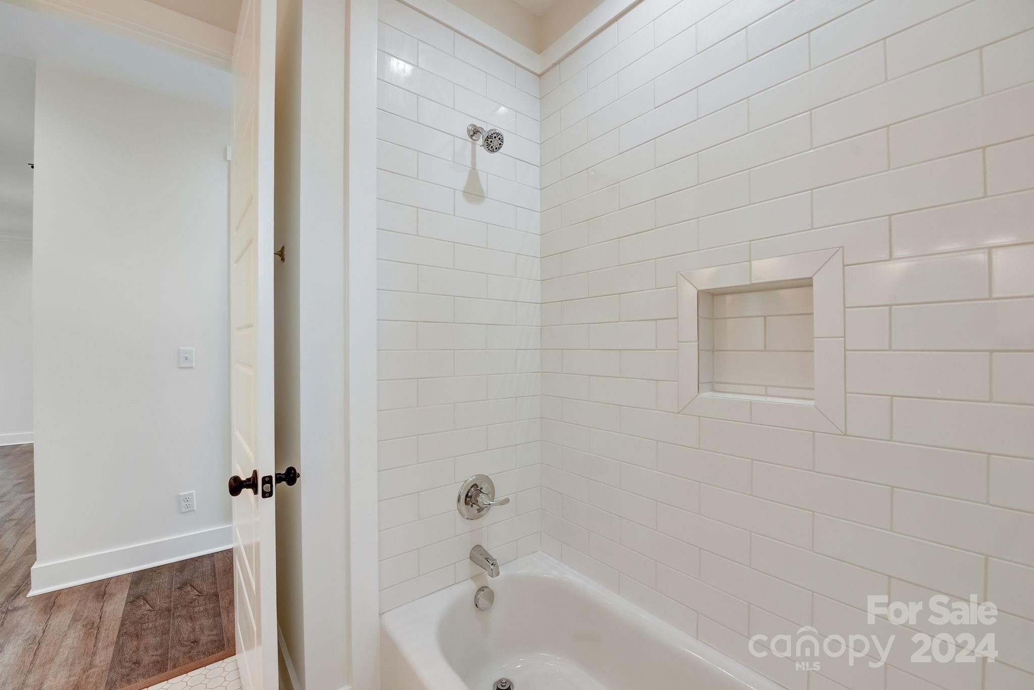 315 Cal Kennedy Road Cleveland, NC 27013 - Photo 21 of 39 a bathroom with a bathtub