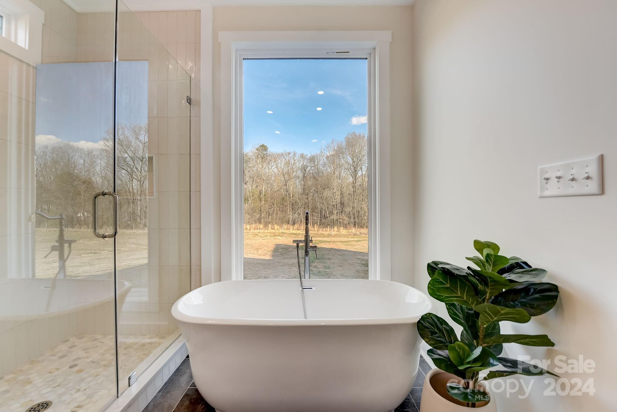 315 Cal Kennedy Road Cleveland, NC 27013 - Photo 24 of 39 a dining room with glass top door and glass door
