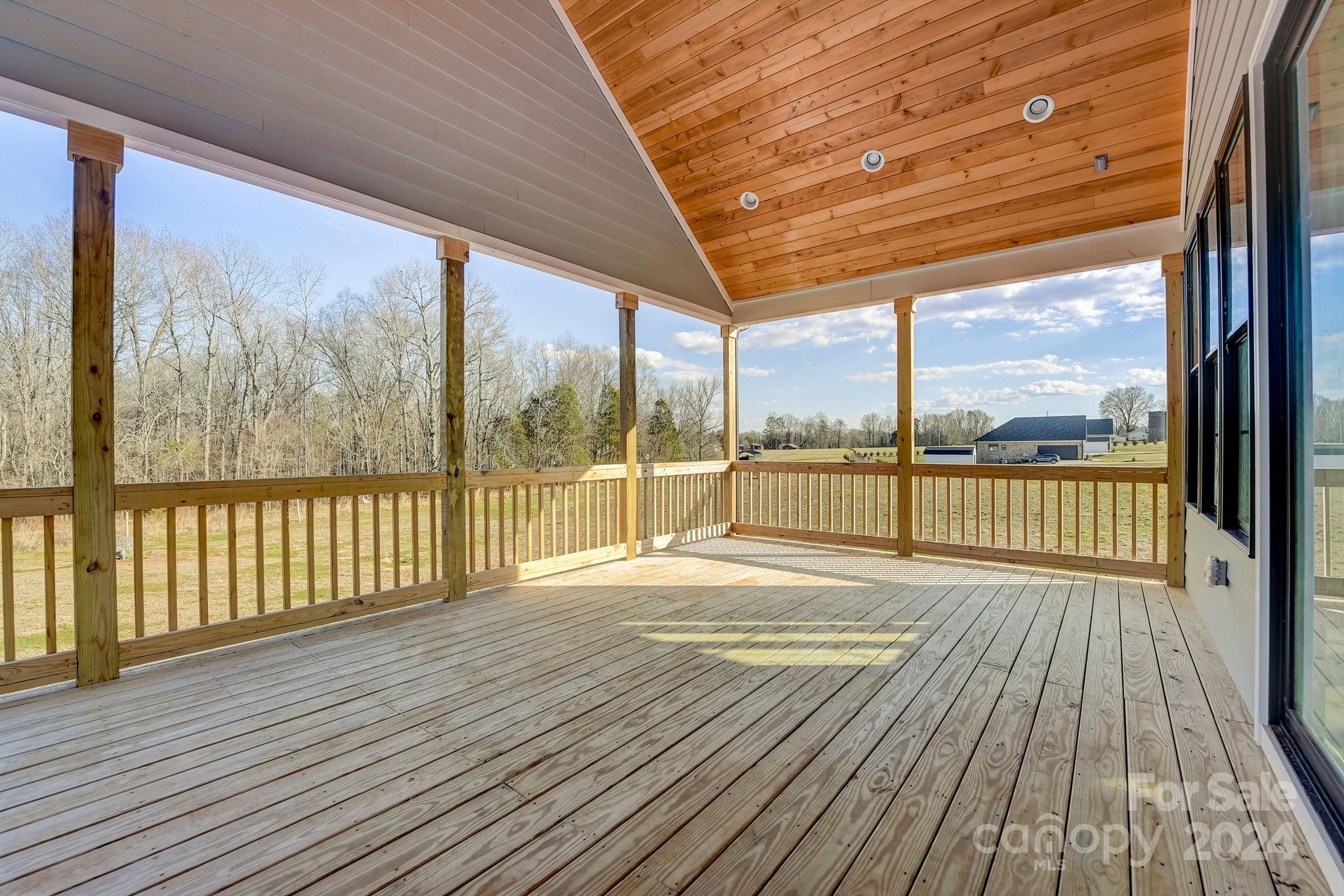 315 Cal Kennedy Road Cleveland, NC 27013 - Photo 32 of 39 a view of balcony with wooden floor