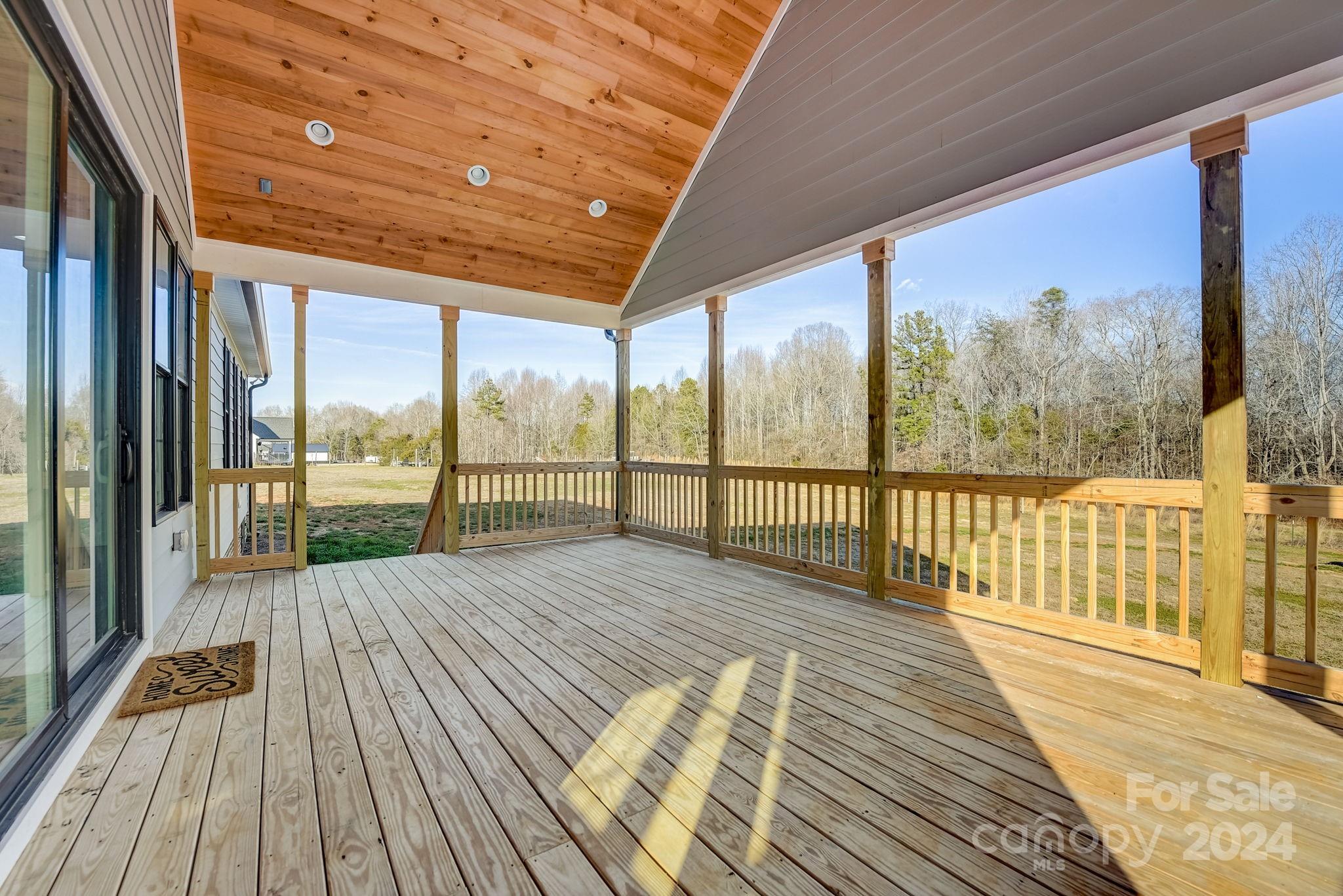 315 Cal Kennedy Road Cleveland, NC 27013 - Photo 33 of 39 a view of balcony with wooden floor