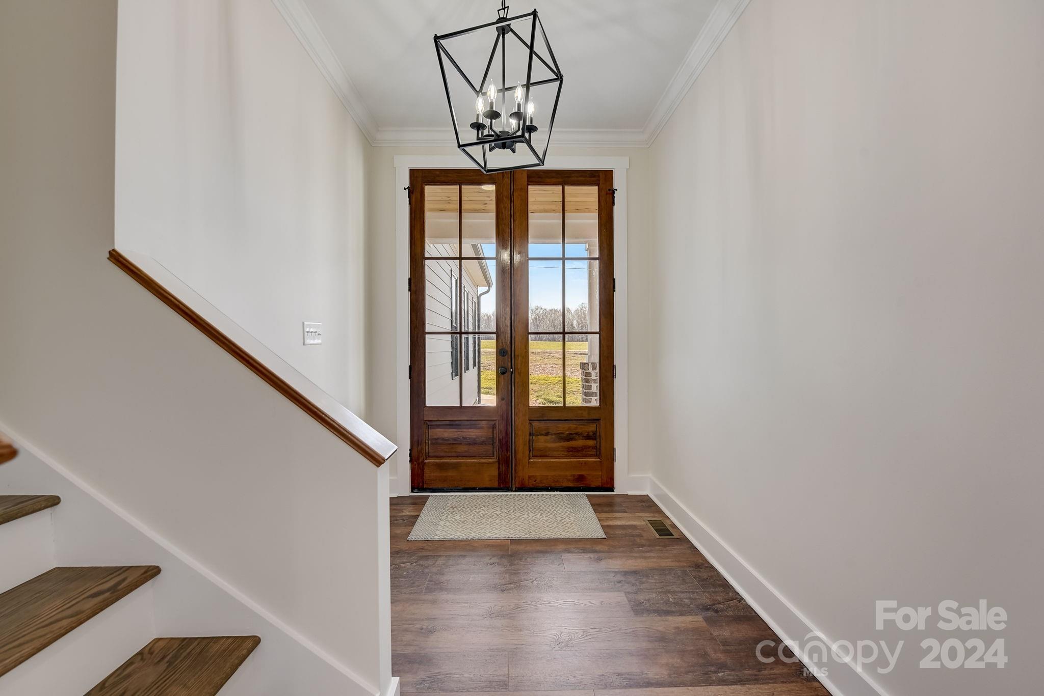 315 Cal Kennedy Road Cleveland, NC 27013 - Photo 5 of 39 a view of entryway with wooden floor