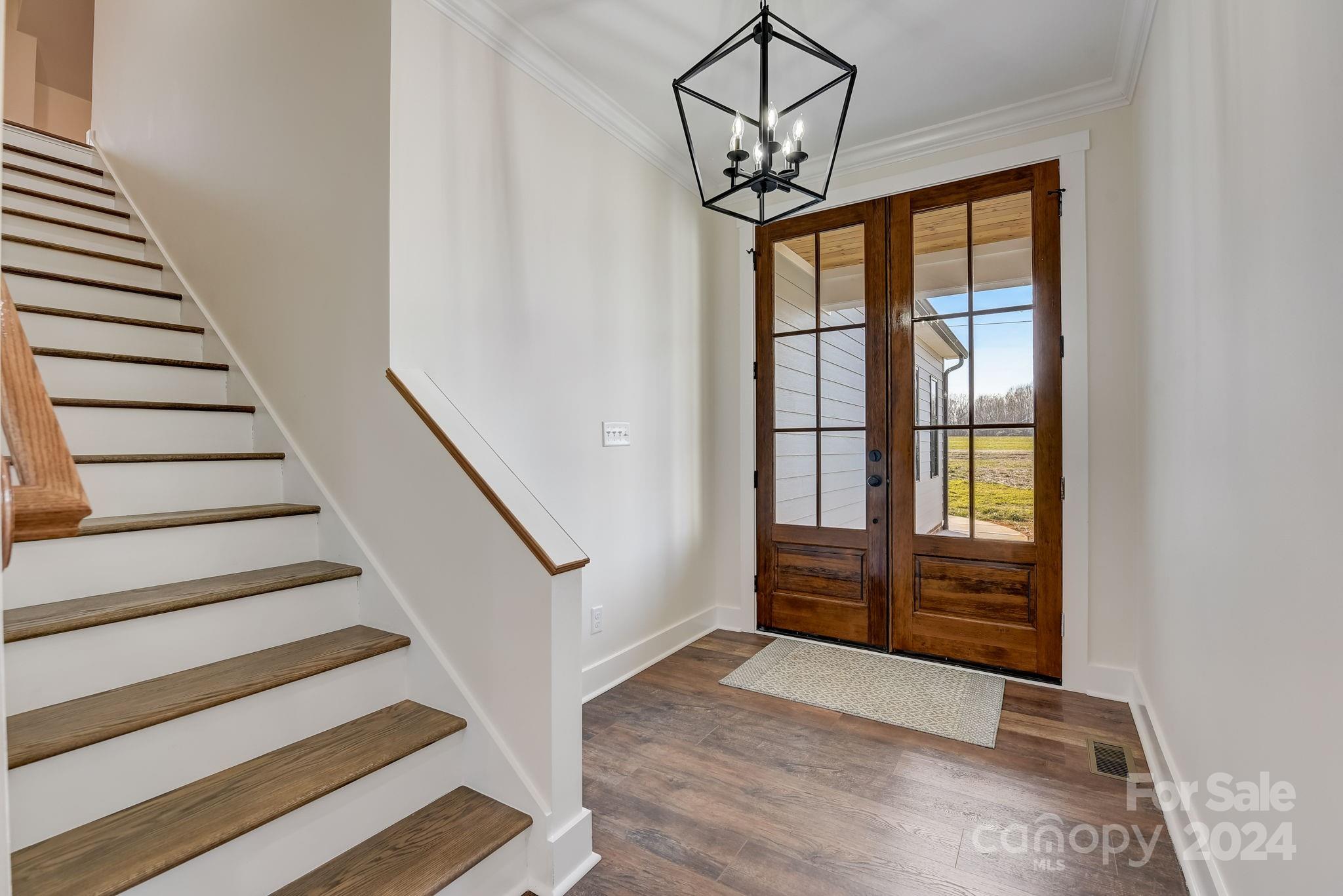 315 Cal Kennedy Road Cleveland, NC 27013 - Photo 6 of 39 a view of entryway and hall with wooden floor