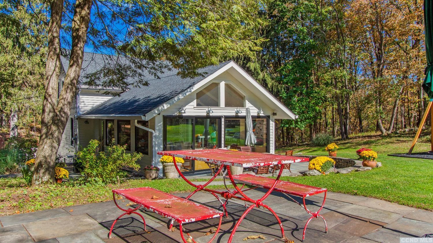 385 Red Top Road Highland, NY 12528 - Photo 30 of 36 a view of a chairs and table in backyard of the house