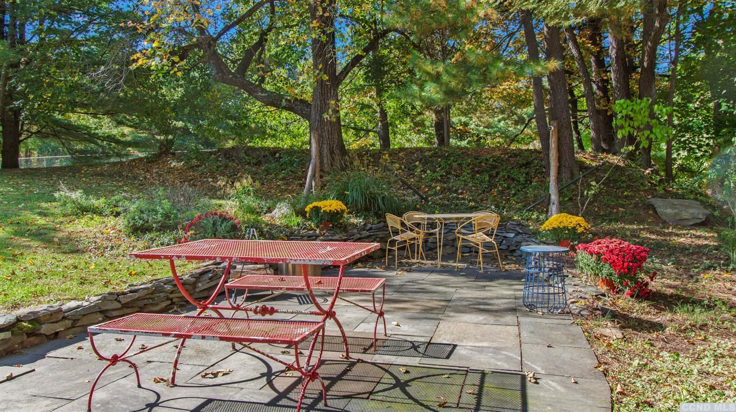 385 Red Top Road Highland, NY 12528 - Photo 31 of 36 a view of a patio with table and chairs potted plants and large tree
