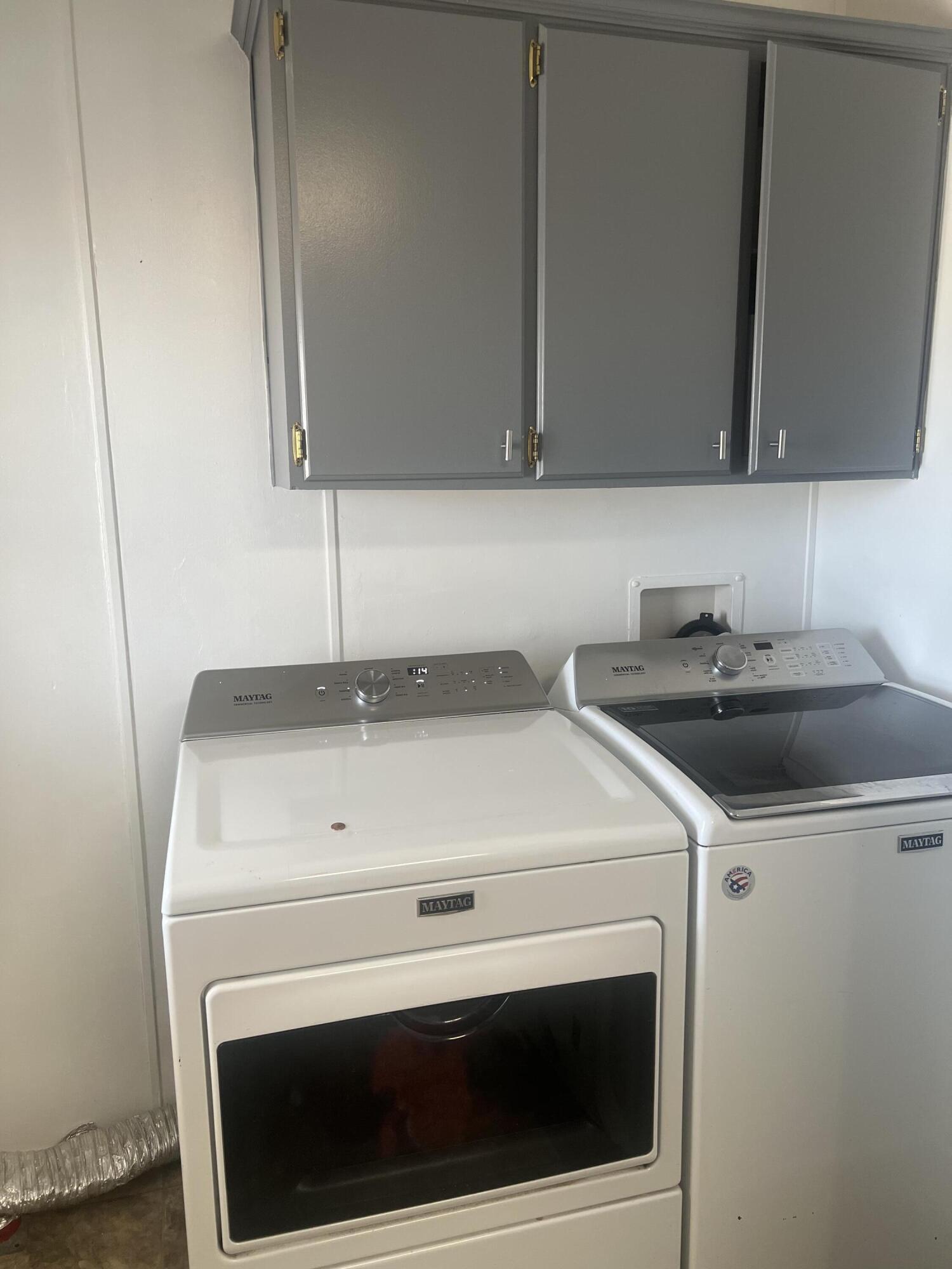 2005 Windcurrent Drive Rosamond, CA 93560 - Photo 13 of 13 a close view of a sink and a stove in a kitchen