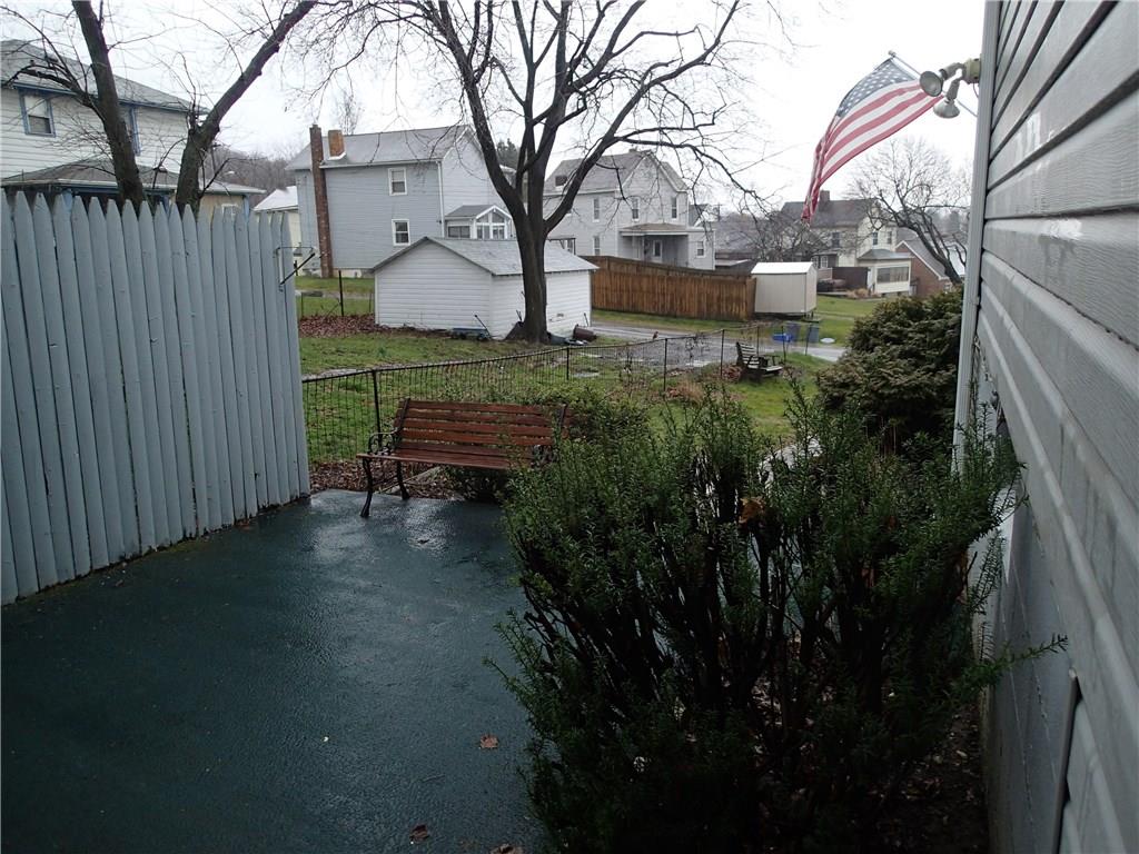 Side patio with privacy fence!