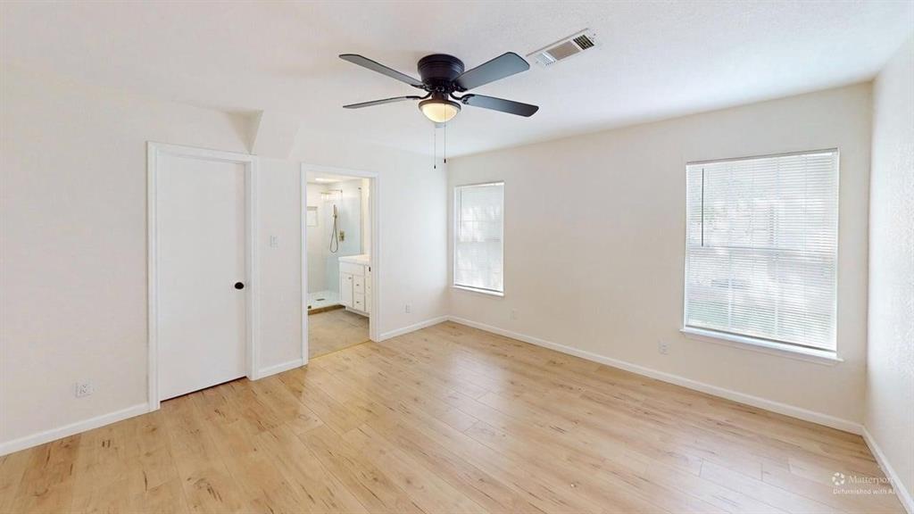 2012 Tennessee Avenue Dallas, TX 75224 - Photo 11 of 19 wooden floor in an empty room with a window