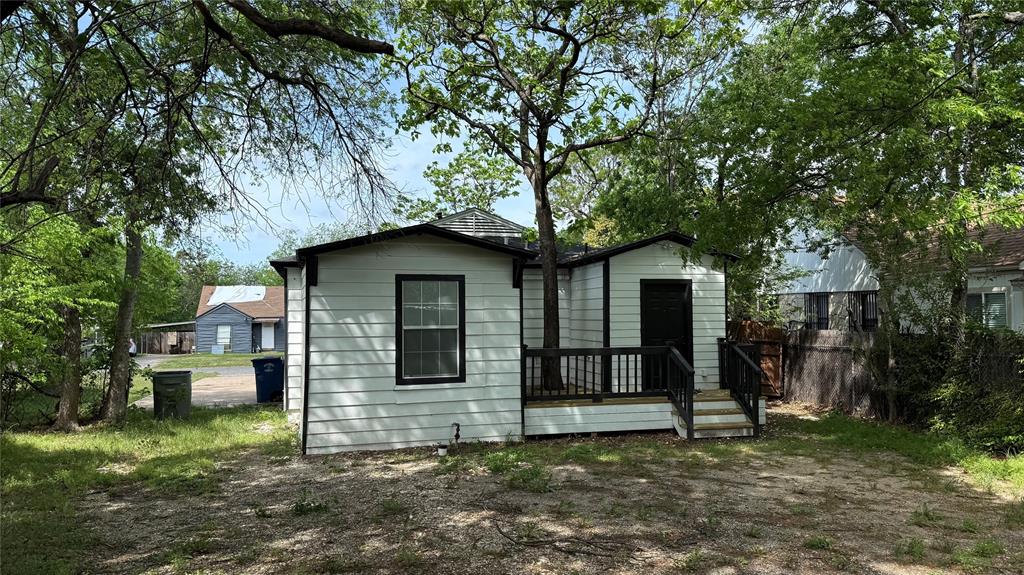 2012 Tennessee Avenue Dallas, TX 75224 - Photo 17 of 19 a house with trees in front of it