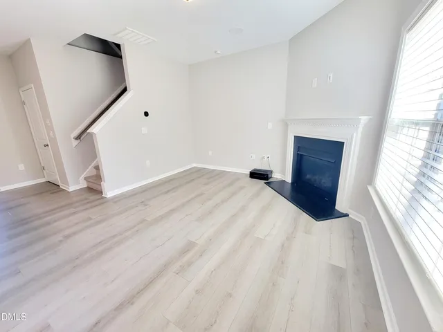 a view of a kitchen with a sink and a microwave
