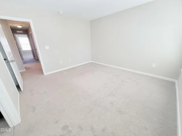 a bathroom with a shower and a tub