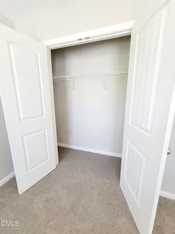 a front view of a house with glass windows