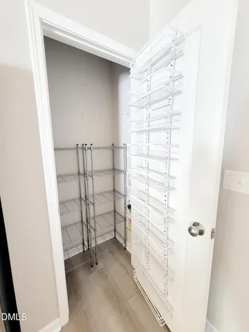 view of walk in closet with empty racks