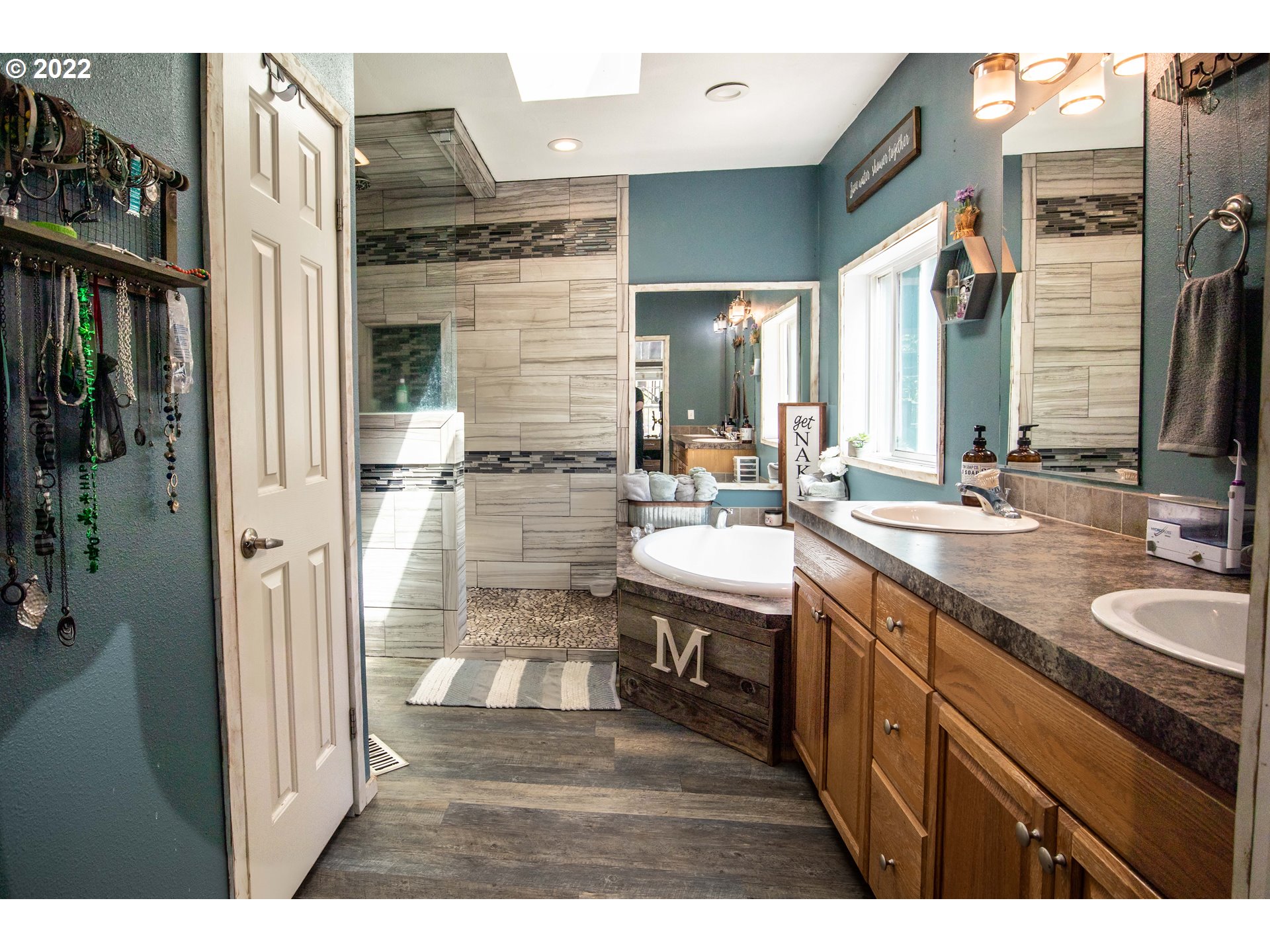 1578 Scholfield Road Reedsport, OR 97467 - Photo 13 of 37 a bathroom with a sink double vanity and a mirror