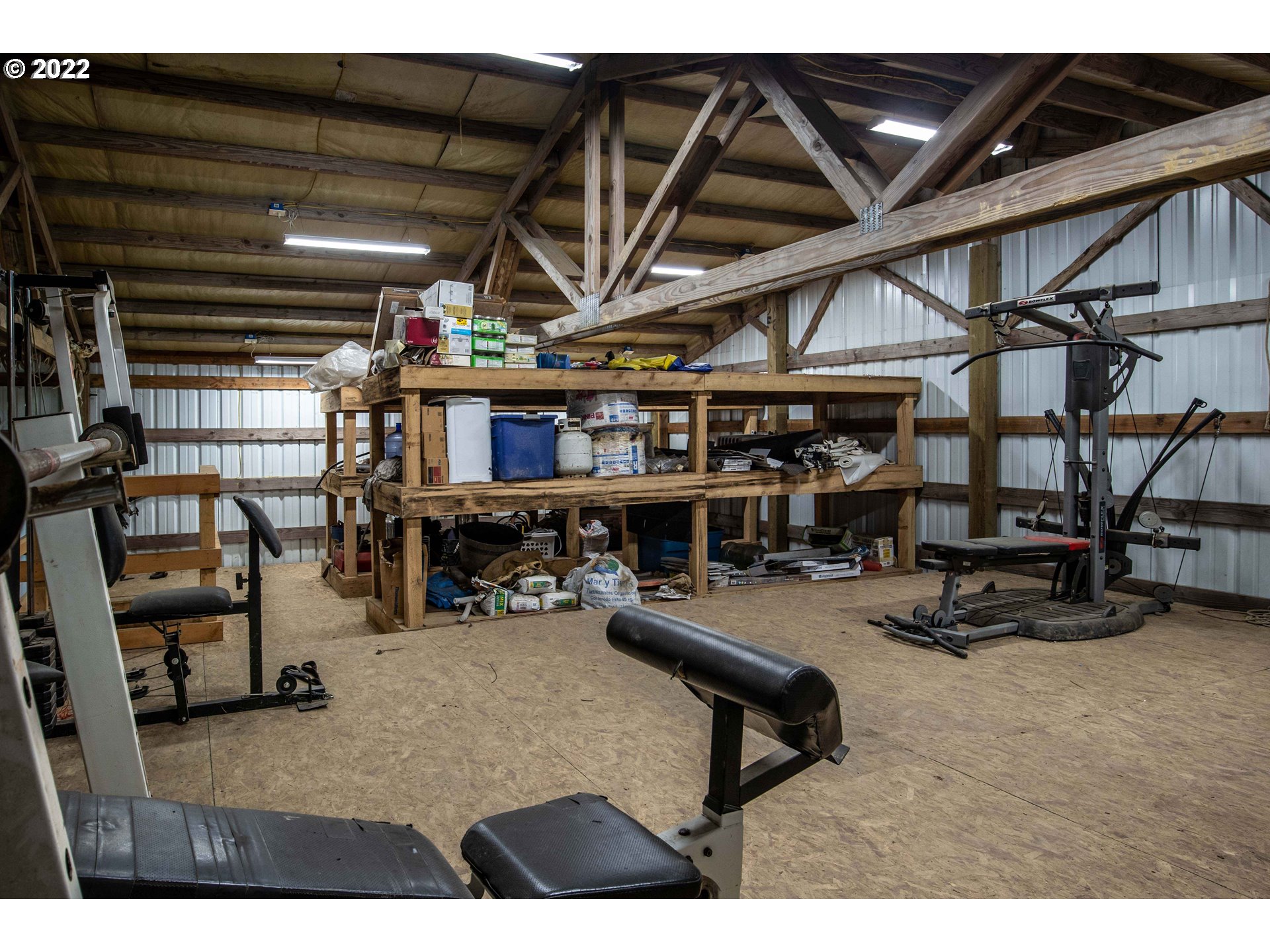 1578 Scholfield Road Reedsport, OR 97467 - Photo 25 of 37 a room with lots of furniture and clutter