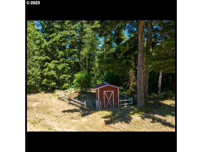1578 Scholfield Road Reedsport, OR 97467 - Photo 27 of 37 a view of a yard in front of a house