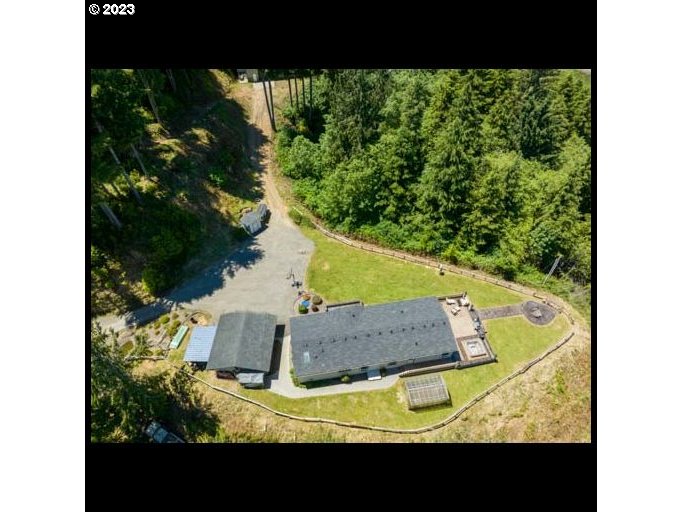 1578 Scholfield Road Reedsport, OR 97467 - Photo 34 of 37 a view of an outdoor space and a swimming pool