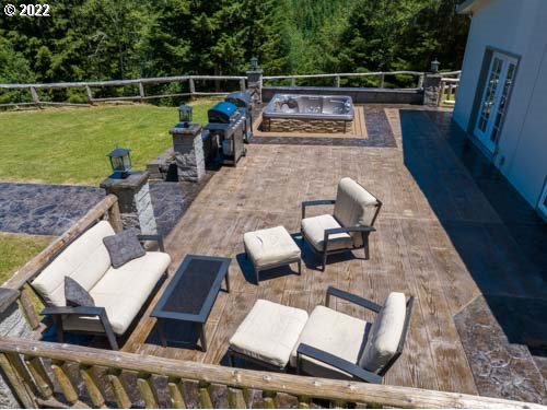 1578 Scholfield Road Reedsport, OR 97467 - Photo 5 of 37 a view of yard from deck with patio