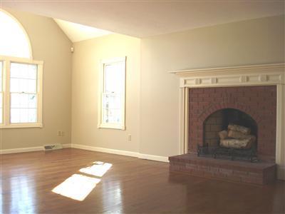 1520 Old Post Road Marstons Mills, MA 02648 - Photo 5 of 20 an empty room with windows and fireplace