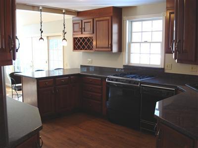 1520 Old Post Road Marstons Mills, MA 02648 - Photo 8 of 20 a kitchen with a sink and cabinets