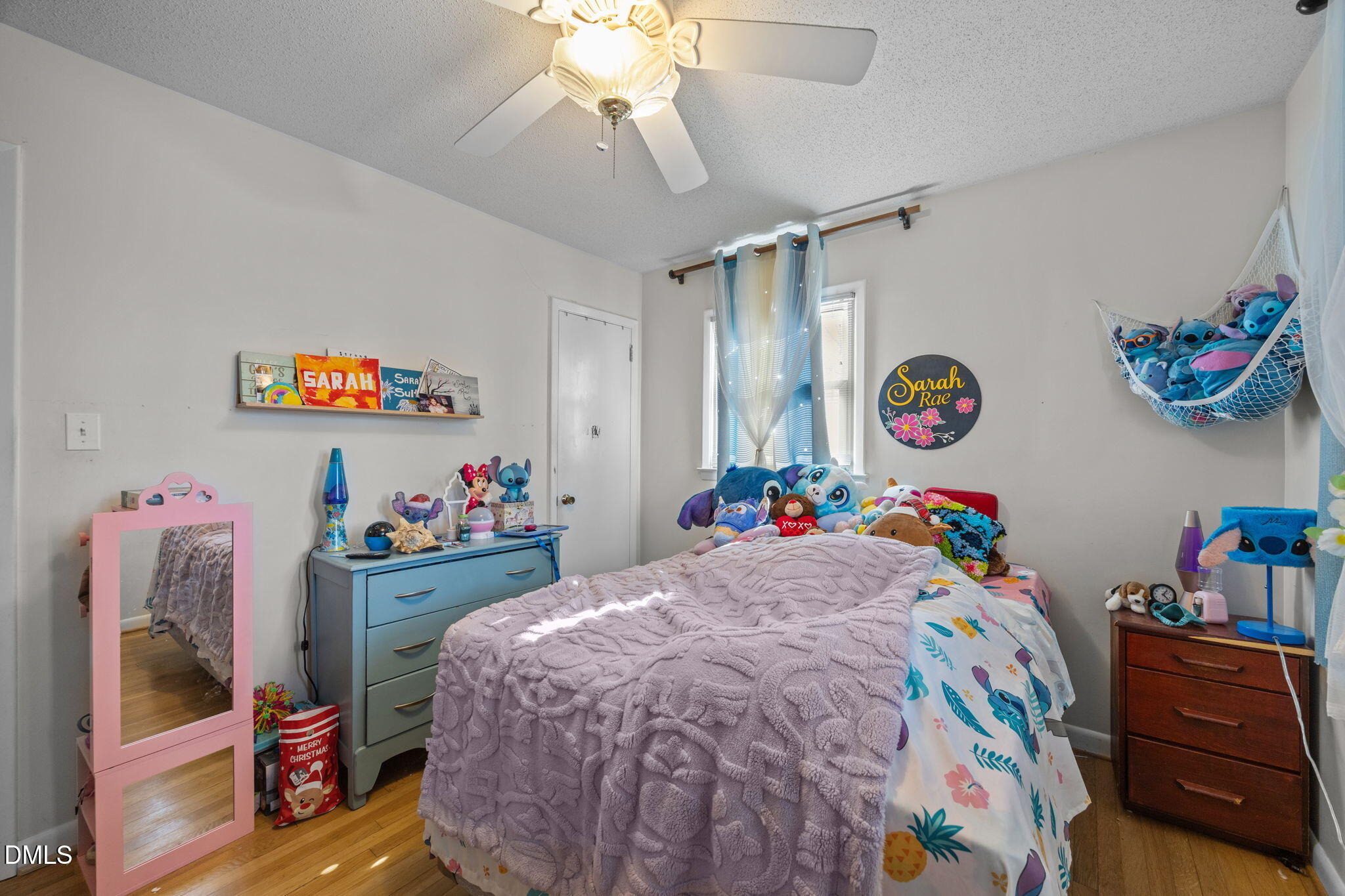 317 Clapp Street Graham, NC 27253 - Photo 20 of 33 a bedroom with a bed and a window