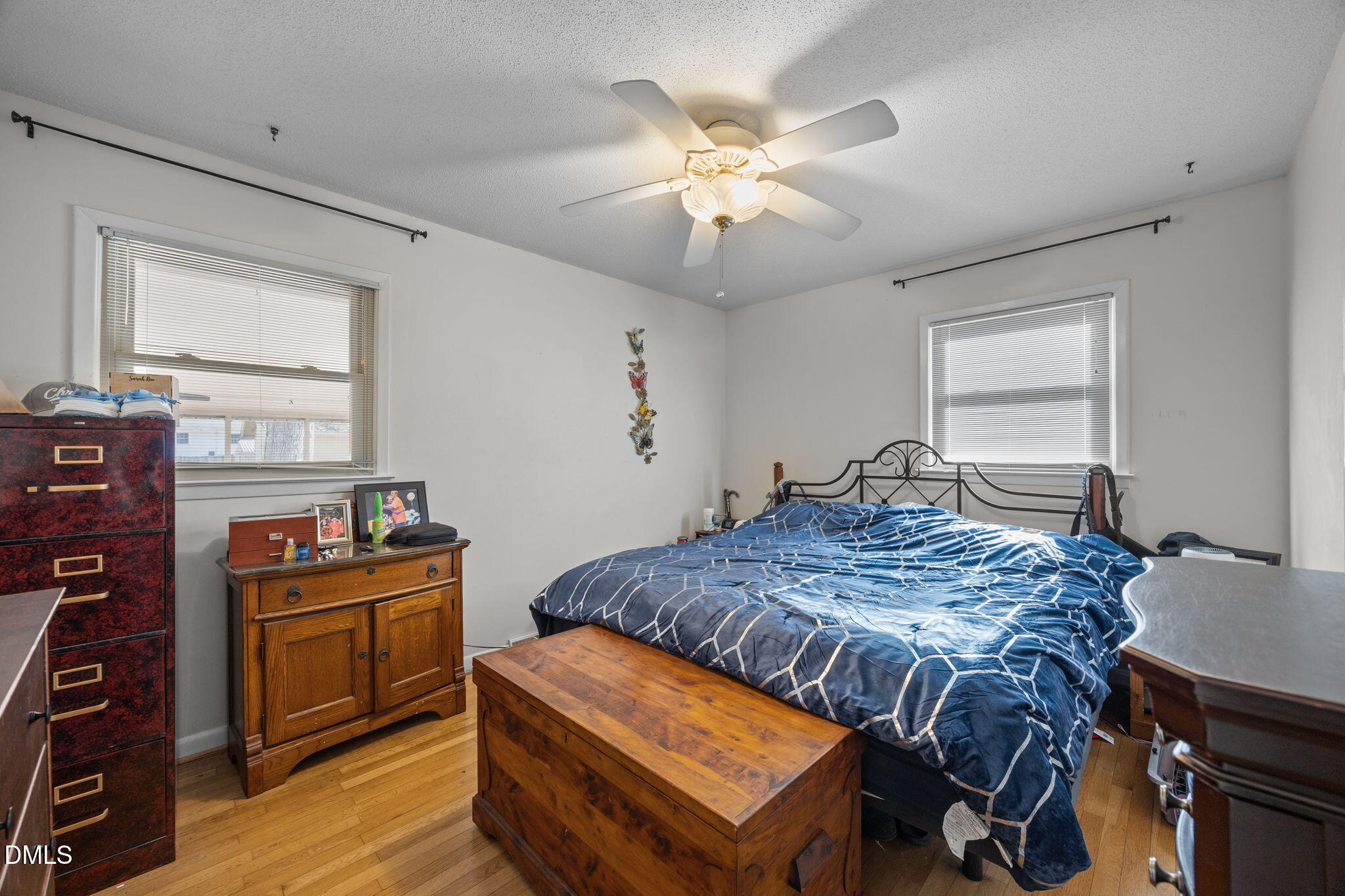 317 Clapp Street Graham, NC 27253 - Photo 21 of 33 a bed room with a bed and dresser