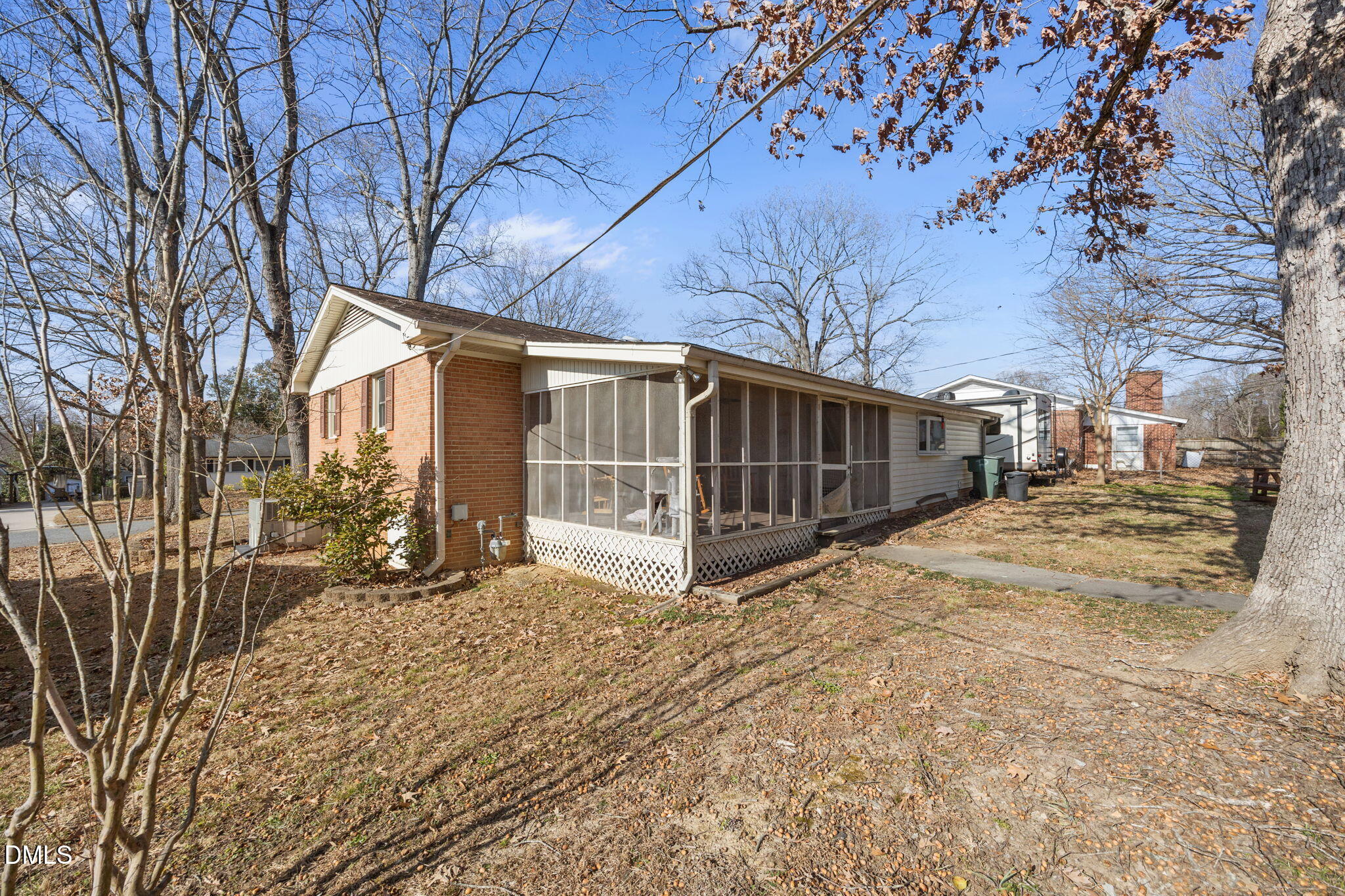 317 Clapp Street Graham, NC 27253 - Photo 29 of 33 a view of a yard covered in snow