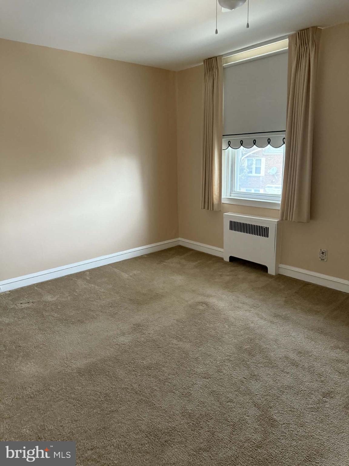 1344 Greeby Street Philadelphia, PA 19111 - Photo 11 of 19 an empty room with windows