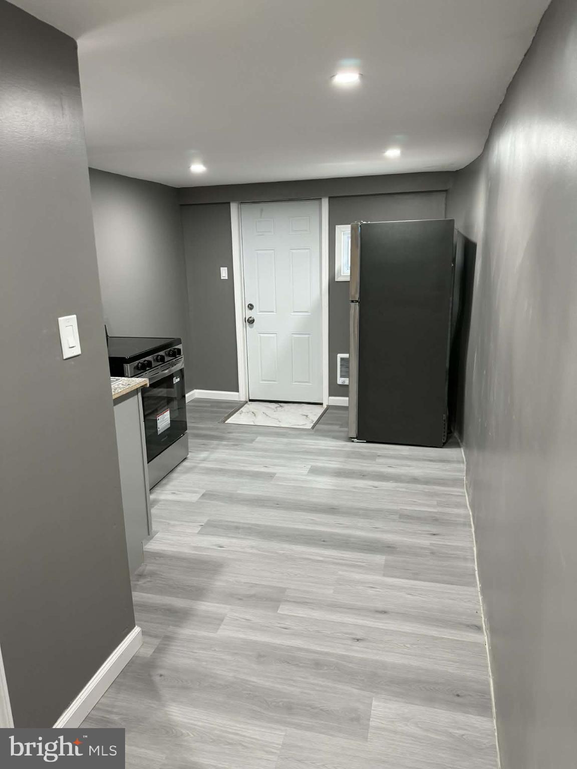 1344 Greeby Street Philadelphia, PA 19111 - Photo 16 of 19 a view of a hallway with stainless steel appliances