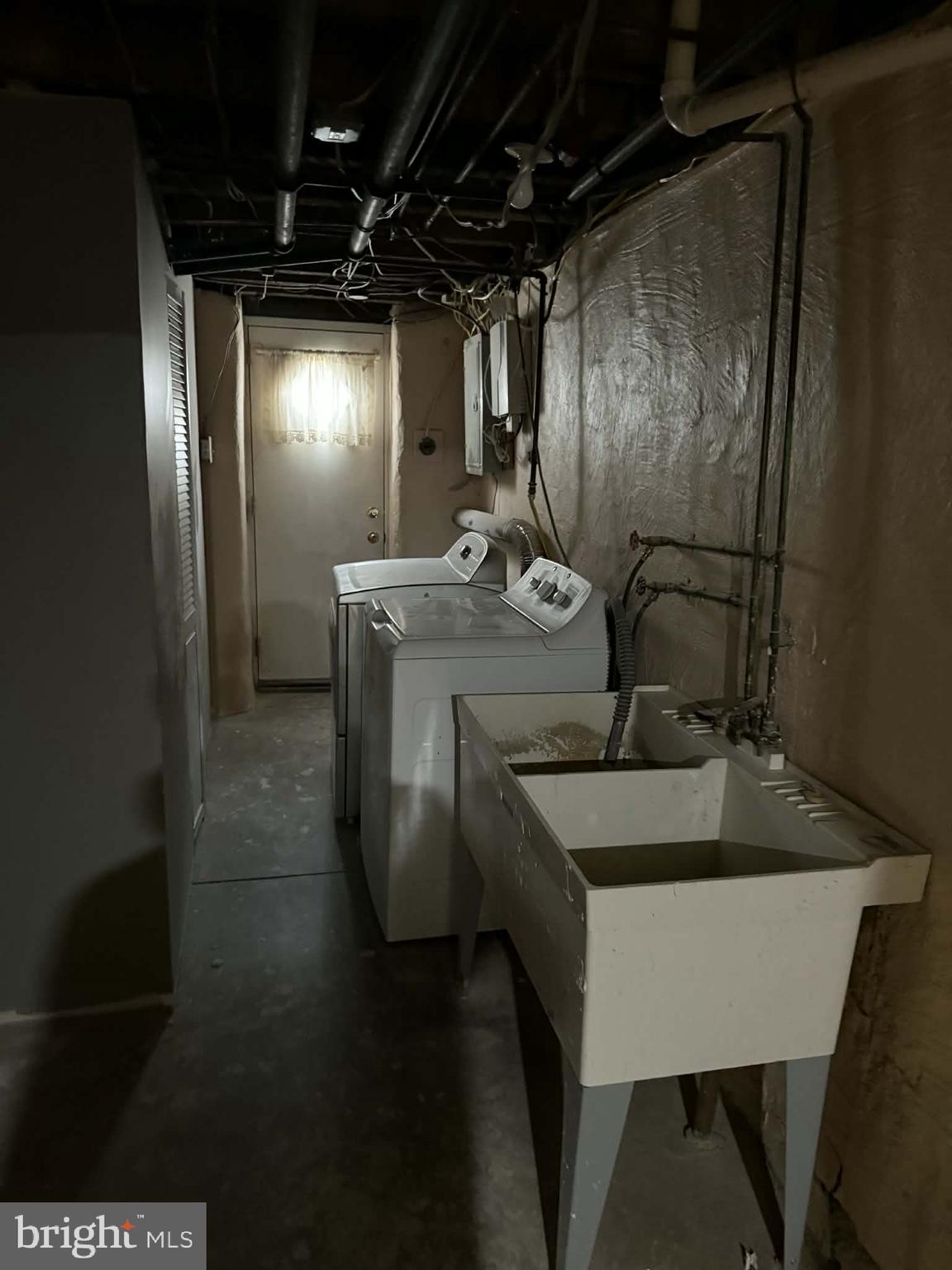 1344 Greeby Street Philadelphia, PA 19111 - Photo 17 of 19 a bathroom with a sink and mirror