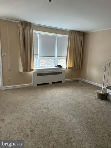 an empty room with window