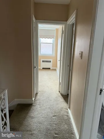 a view of a closet in a room