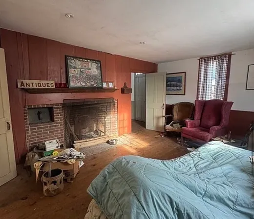 a view of a refrigerator with wooden floor