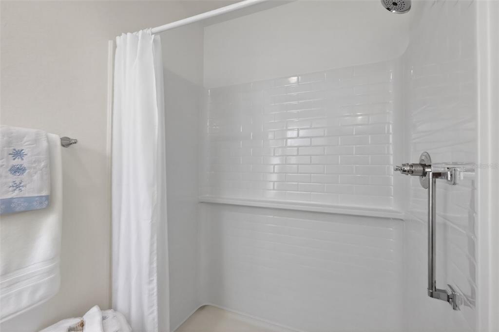 832 Conroe Street The Villages, FL 34762 - Photo 21 of 37 a bathroom with a shower