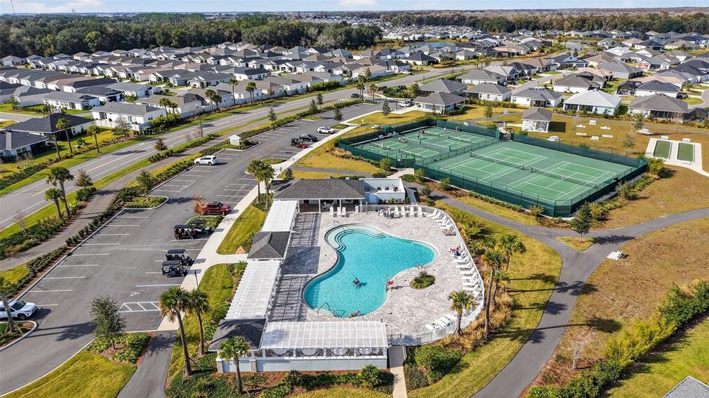 832 Conroe Street The Villages, FL 34762 - Photo 35 of 37 an aerial view of residential houses with outdoor space