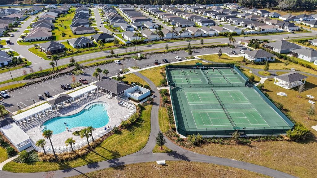832 Conroe Street The Villages, FL 34762 - Photo 36 of 37 an aerial view of a house with a swimming pool