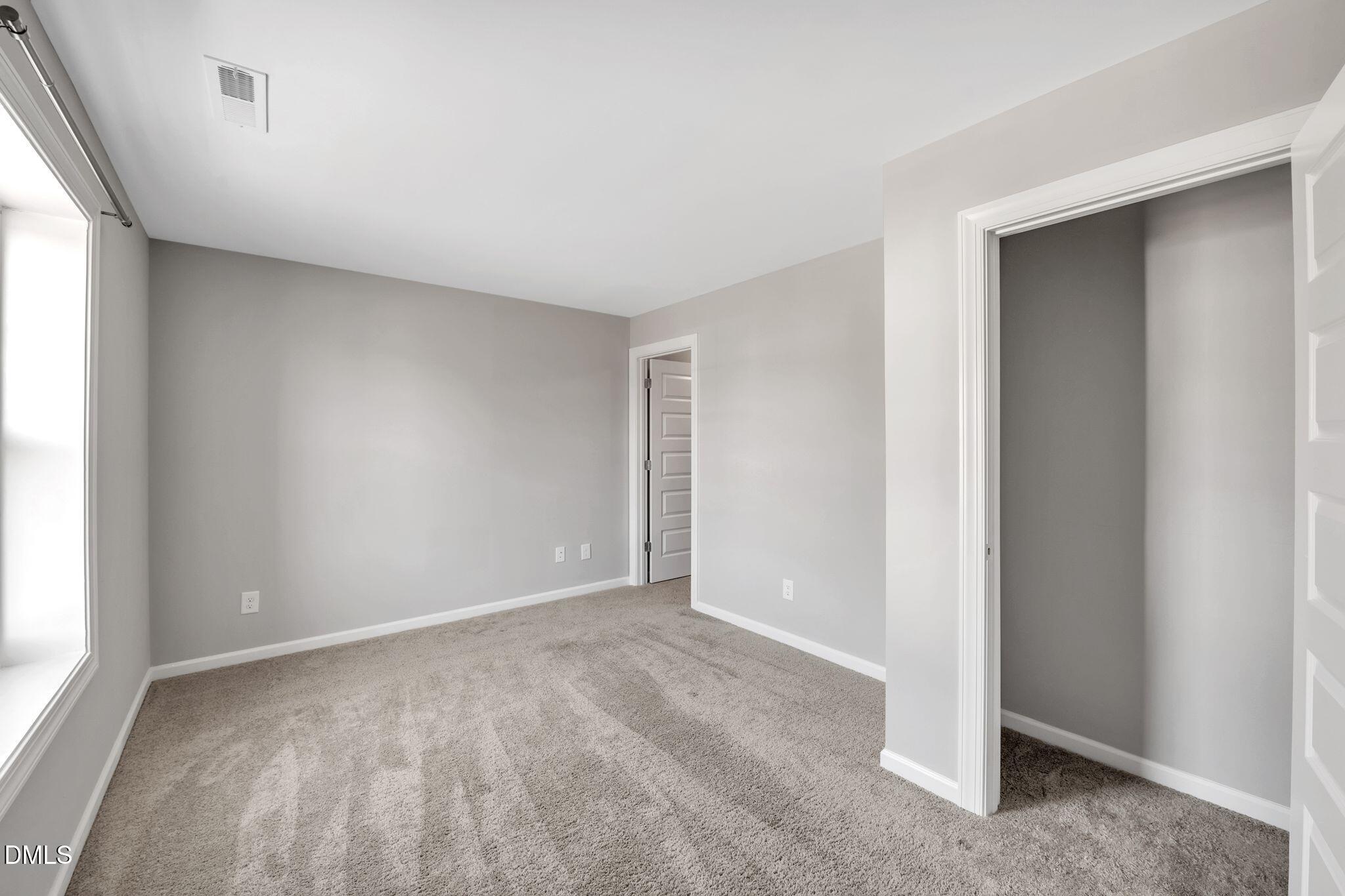 1505 Tawny View Lane Raleigh, NC 27603 - Photo 11 of 15 a view of an empty room with a window