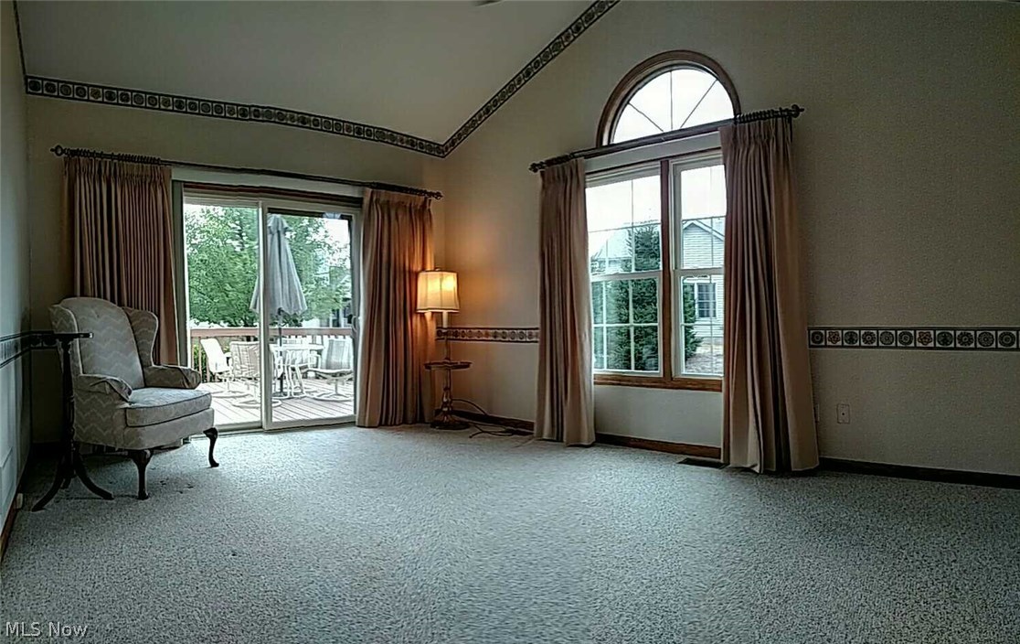 2608 Charing Cross Road Northwest Canton, OH 44708 - Photo 11 of 24 Family Room/Den/Study with newer Marvin windows and patio doors. Neutral carpet and draperies mean you can move right in.