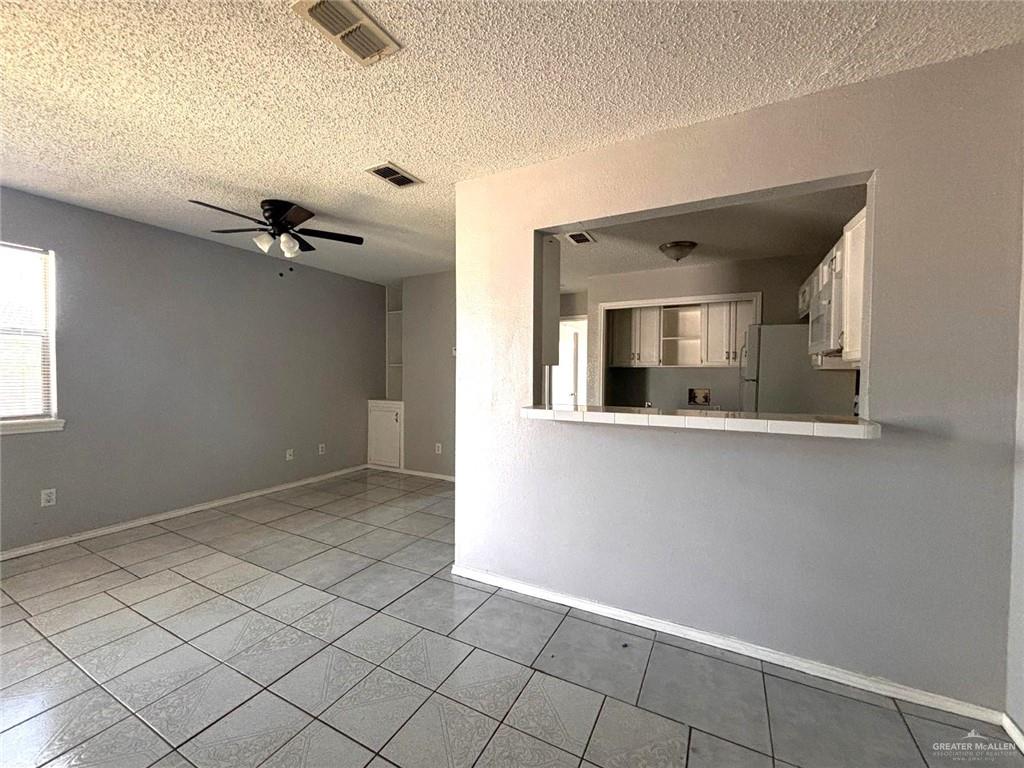 6220 North 11th Street, Unit F McAllen, TX 78504 - Photo 3 of 7 a view of an empty room with a window