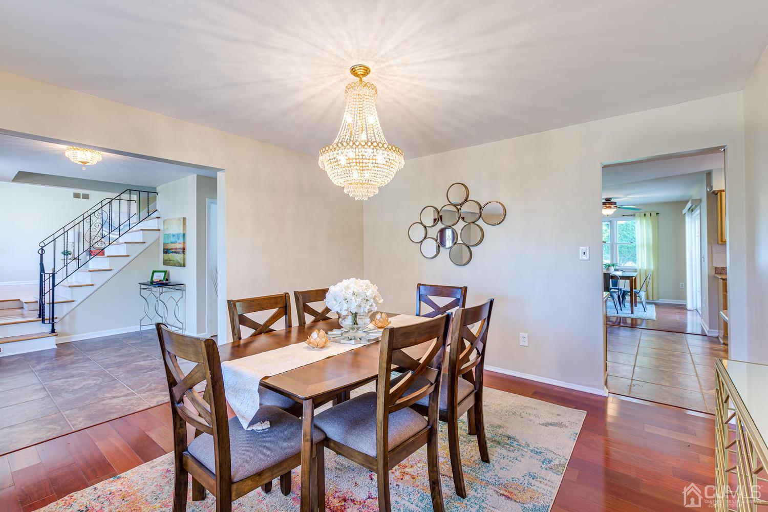 799 New Dover Road Edison, NJ 08820 - Photo 12 of 54 a view of a dining room with furniture