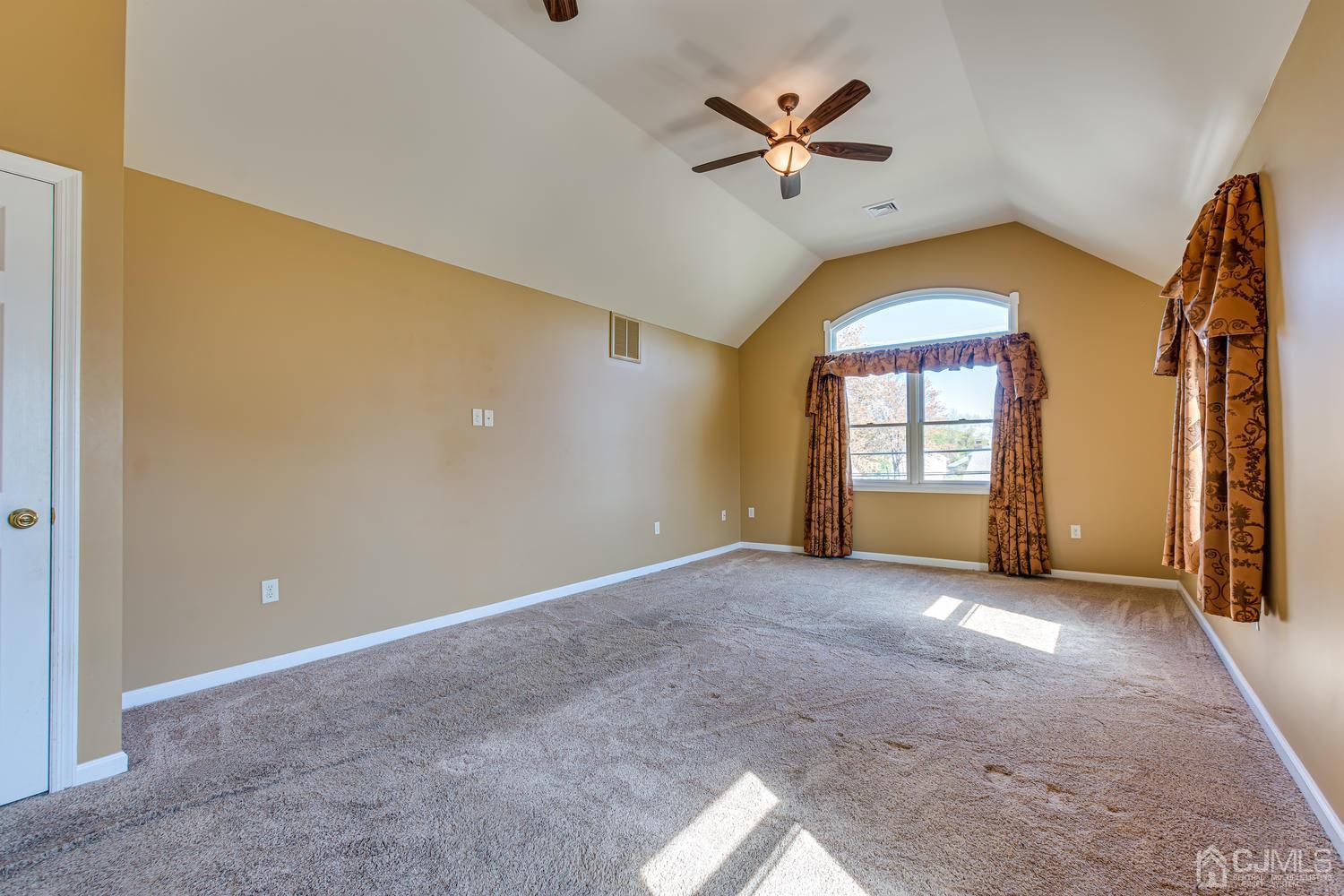 799 New Dover Road Edison, NJ 08820 - Photo 32 of 54 wooden floor in an empty room with a window