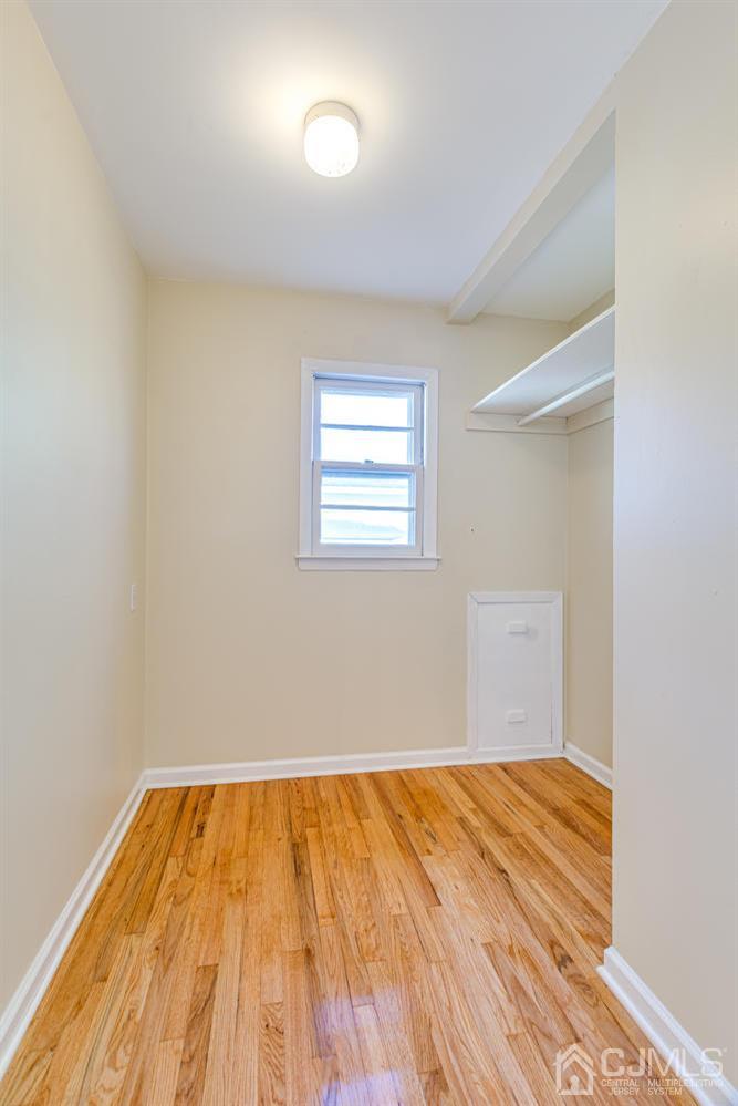 799 New Dover Road Edison, NJ 08820 - Photo 40 of 54 wooden floor in a room